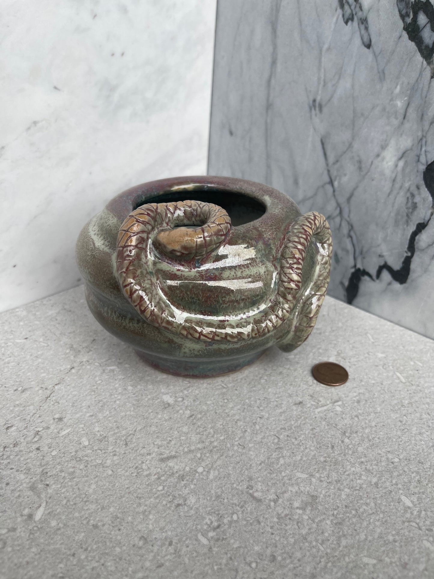 Carved Snake Vessel